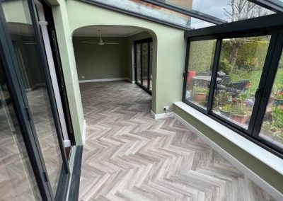 Polyfloor Camaro LVT flooring range fitted in the herringbone design to the ground floor - Toddington LU5