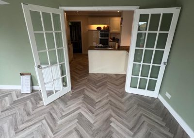 Polyfloor Camaro LVT flooring range fitted in the herringbone design to the ground floor - Toddington LU5