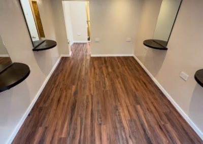 Polyfloor Camaro LVT flooring range fitted in the antique rosewood design to the ground floor - Ampthill MK45