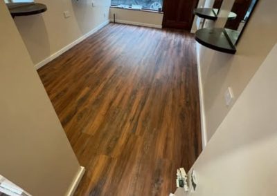 Polyfloor Camaro LVT flooring range fitted in the antique rosewood design to the ground floor - Ampthill MK45