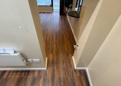 Polyfloor Camaro LVT flooring range fitted in the antique rosewood design to the ground floor - Ampthill MK45