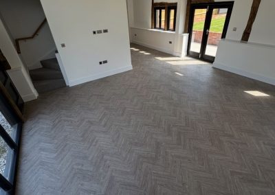 Polyfloor Camaro LVT flooring range fitted in the classic herringbone design to the ground floor - Dunstable LU5