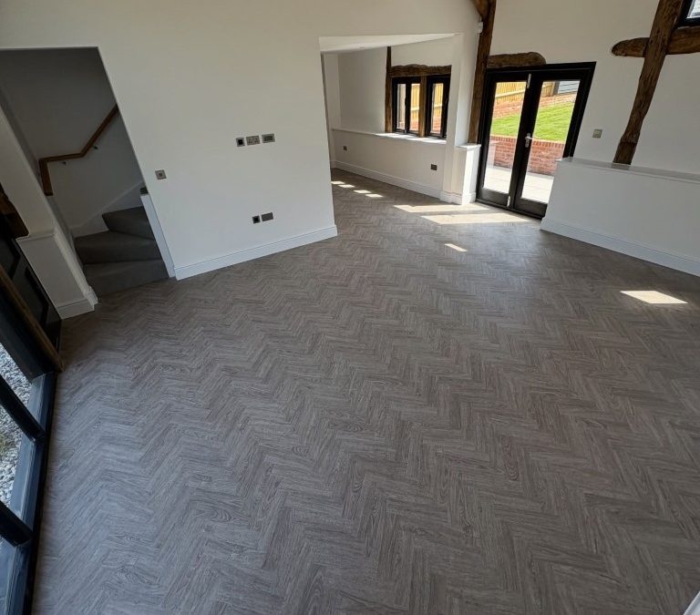 Polyfloor Camaro Naked Blond Oak LVT flooring in a classic herringbone design – Project 30