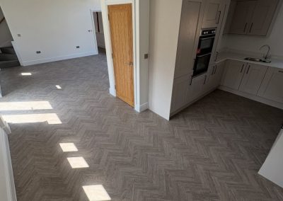 Polyfloor Camaro LVT flooring range fitted in the classic herringbone design to the ground floor - Dunstable LU5