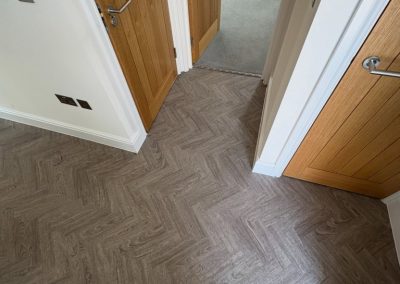 Polyfloor Camaro LVT flooring range fitted in the classic herringbone design to the ground floor - Dunstable LU5