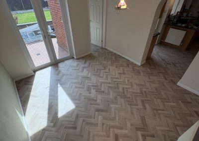 Colonia LVT flooring in Oak Plank, Bloomfield Oak Herringbone and Balmoral Grey Slate designs fitted - Flitwick MK45