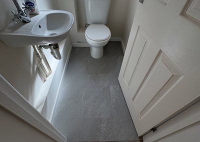 Colonia LVT flooring in Oak Plank, Bloomfield Oak Herringbone and Balmoral Grey Slate designs fitted - Flitwick MK45