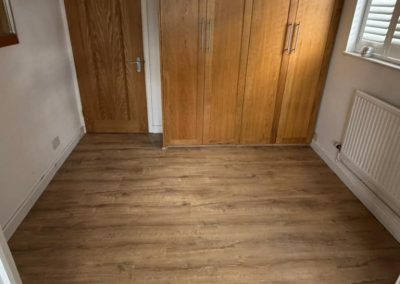 Elka Supreme Country Oak Laminate fitted - Wootton MK43